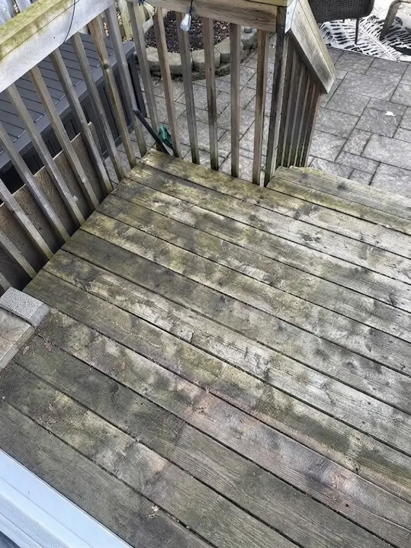 Gray weathered wood deck before cleaning